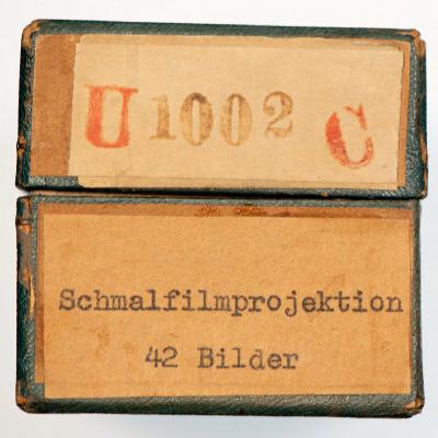 Schmalfilmprojektion. U 1002